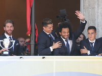 (L-R) Sergio Ramos, Cristiano Ronaldo, Marcelo, Lucas Vazquez during the celebrations of Real Madrid Spanish League in Madrid headquarters o...