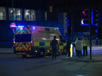 An ambulance goes in to the cordoned off area, outside the Manchester Arena, after an explosion after the Ariana Grande concert which took p...