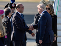 US President Donald Trump and Angelino Alfano,  shake hands at the Airport Fiumicino in  Rome on may 23, 2017 (