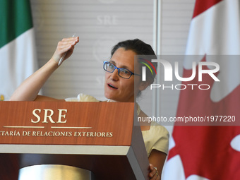 Chrystia Freeland Canada's Minister  of Foreign Affairs is seen Raising a hand during a press conference offers to media as part of her work...