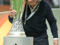 Manchester United's Portuguese manager Jose Mourinho kisses the trophy after the UEFA Europa League final football match Ajax Amsterdam v Ma...