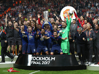 Wayne Rooney of Manchester United lifts The Europa League trophy after the UEFA Europa League Final between Ajax and Manchester United at Fr...