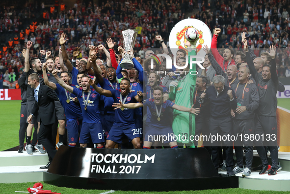 Wayne Rooney of Manchester United lifts The Europa League trophy after the UEFA Europa League Final between Ajax and Manchester United at Fr...