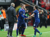 Manchester United's English striker Wayne Rooney substitutes Manchester United's Spanish midfielder Juan Mata during the UEFA Europa League...