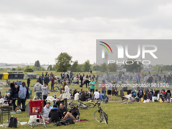 Families and friends grill and spend time together on Father's or Men's day at the Tempelhofer Feld park in Berlin, Germany on May 25, 2017....