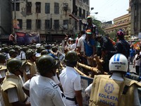 Indian police stopped the Bharatiya Janata Party activists during their march to the police headquarters in Kolkata, India on Thursday, 25th...