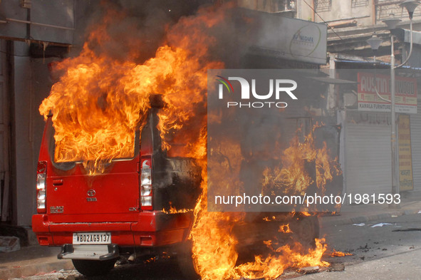 BJP activists  set on fire Kolkata Police Jeep during a protest demonstration against All India Trinamool congress Government near Kolkata P...