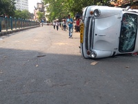 Ambassador car turned down during a protest march by BJP workers from Howrah, College Square and Esplanade towards Lalbazar, Kolkata Police...