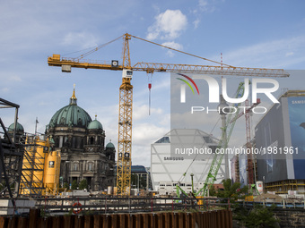 The Dome of Berlin (L, the Humboldt Box (C) and the construction site of the Humboldt Forum (R) are pictured in Berlin, Germany on May 25, 2...