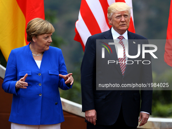G7 Summit 2017 in Italy
The Germany Chancellor Angela Merkel with the President of the United States of America Donald Trump during the wel...