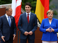 G7 Summit 2017 in Italy
The President of the European Council Donald Tusk with the Canada Prime Minister Justin Trudeau and the Germany Cha...