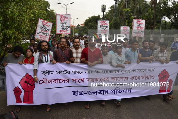 Bangladeshi left wing students march in the street towards the Supreme Court to protest in Dhaka, Bangladesh, on May 26, 2017. A Lady Justic...