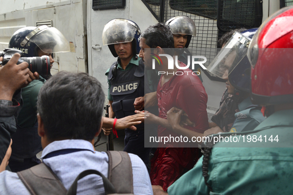 Bangladeshis policeman arrested a activists during a protest against the removal of a Lady Justice statue in Dhaka, Bangladesh, on May 26, 2...