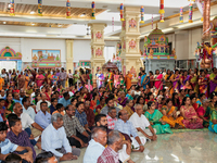 Tamil Hindu devotees listen to special prayers honouring Lord Murugan during the Murugan Ther Festival at a Tamil Hindu temple in Ontario, C...