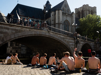 The people of Ghent and also a lot of tourists took the streets of this Belgian city during the high temperatures, on May 26, 2017.. To try...