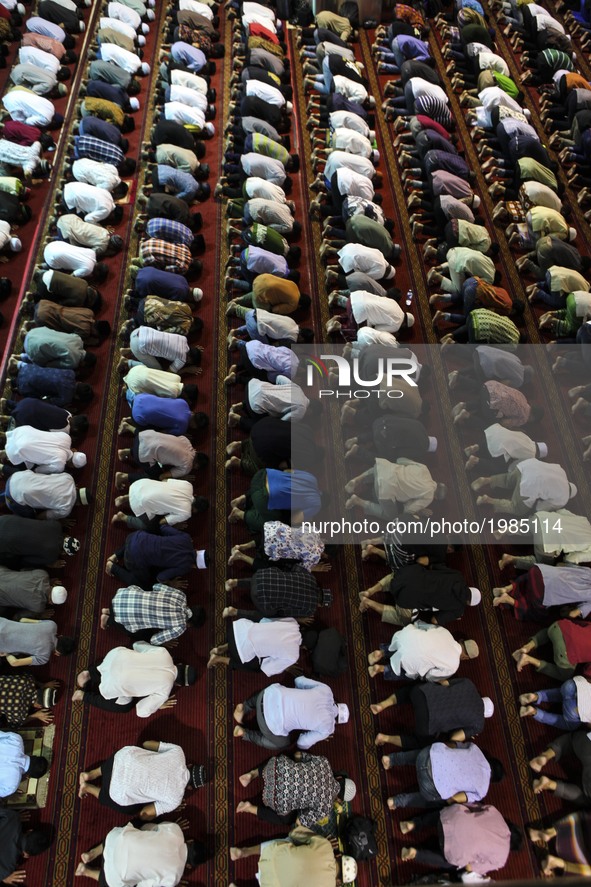 Muslims perform the first 'Tarawih' prayer on the eve of the Islamic holy month of Ramadan at Istiqlal Mosque, Jakarta, Indonesia on May 26,...