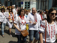 Ukrainians wearing traditional Ukrainian embroidered blouses called 