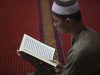 Indonesian muslim read Al quran during first day of Ramadan in Istiqlal Mosque, Jakarta, Indonesia, on May 27, 2017. During the holy month o...