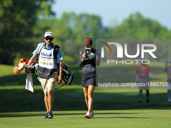 Belen Mozo of Spain and caddie walk on the fairway of the 6th hole during the third round of the LPGA Volvik Championship at Travis Pointe C...