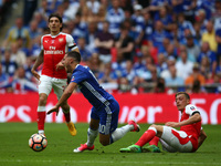 Chelsea's Eden Hazard gets is tackled by Arsenal's Mesut Ozil
during The Emirates FA Cup - Final between
Arsenal against Chelsea at Wembley...