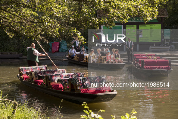 Visitors enjoy the sunny weekend day on a boat in the small harbour of Luebbenau in the region of the Spreewald, Germany on May 27, 2017.  T...