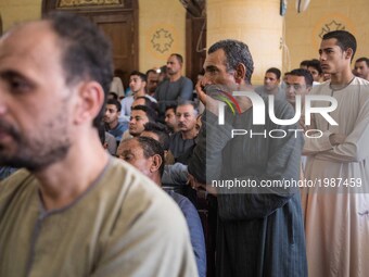 Prayers in 'Deir El-Garnouse Coptic church , near Al-Minya for the victims of of a terrorist attack. The prayers used to made in the homes o...