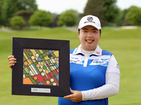Shanshan Feng of China holds up the trophy after winning the the Volvik Championship during the final round of the Volvik Championship held...