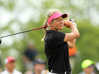 Suzann Pettersen of Norway tees off on the 17th tee during the final round of the LPGA Volvik Championship at Travis Pointe Country Club, An...