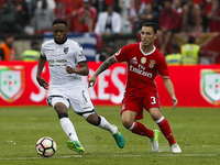 Vitoria SC's forward Hernani (L) vies for the ball with Benfica's defender Alejandro Grimaldo (R)  during the Portugal Cup football final ma...