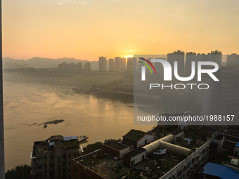 A view of a part of Chongqing at sun raise (Population +8 Mln, Metro 52 Mln), one of China's four direct-controlled municipalities (the othe...