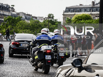 Police officers are partolling by motors  along Champs Elysees boulevard in Paris, France on May 28, 2017. Much of French people and tourist...