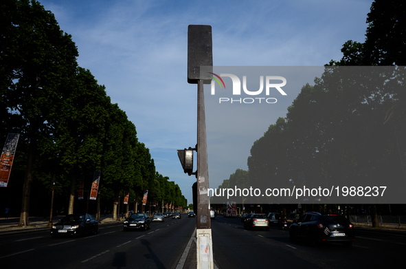 Champs Elysees boulevard in Paris, France on May 28, 2017. Much of French people and tourists enjoyed hot and sunny weather with temperature...