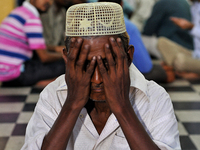 Indian Muslim pray at the historical Tipu Sultan Masque to break their first Roza as the holy month of Ramadan begins, on May 28, 2017 in Ko...