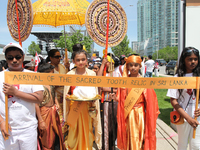 Sri Lankan youth take part in a procession during the festival of Vesak in Mississauga, Ontario, Canada, on 28 May 2017. Vesak (Wesak) commo...