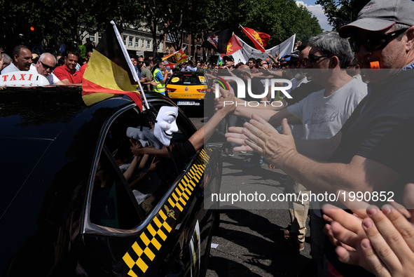 Belgian taxi drivers during a protest by a Spanish taxi drivers in Madrid.
 