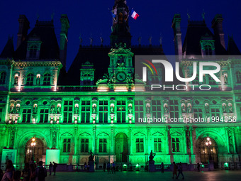 The Paris city hall on 1 June, 2017 is lightened in green « to mark the disapprobation » of the french capital and its socialist mayor Anne...