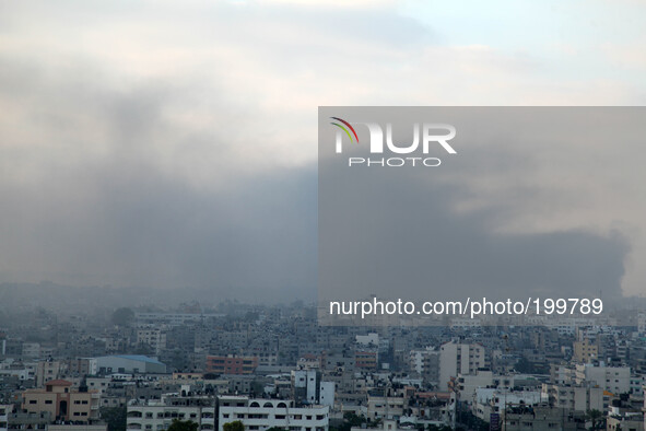 Smoke from Israeli strikes rises over Gaza City, in the Gaza Strip, early as the sun rise ,U.S. Secretary of State, John Kerry, announces a...