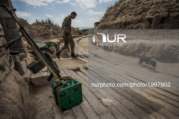 Soldier of Nagorno Karabakh army in the trenches close to Martakert frontline, less than 300 meters of the Azerbaijan army positions. 