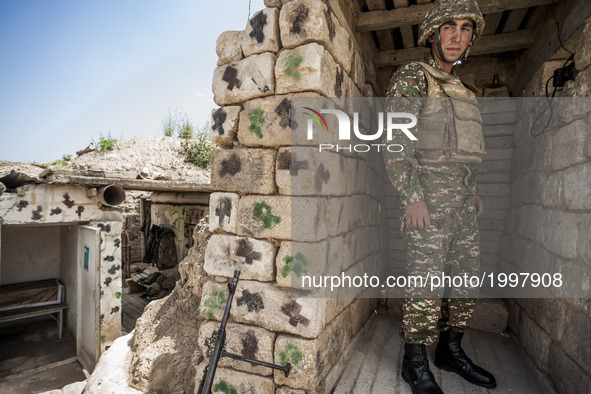 Soldier of Nagorno Karabakh army  in the trenches close to Martakert frontline, less than 300 meters of the Azerbaijan army positions. 