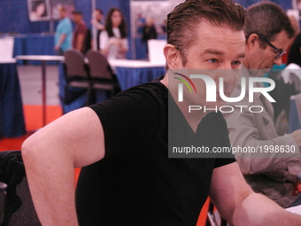 James Marsters jokes with fans during a signing event at Wizard World Comic Convention in Philadelphia, PA on June 2, 2017 (