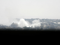 Smoke rises following what witnesses said were Israeli air strikes in Rafah in the southern Gaza Strip on August 1, 2014. A Gaza ceasefire c...