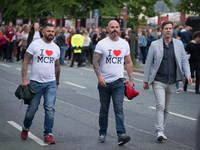 People arrive for the One Love Manchester benefit concert at the Old Trafford cricket ground in Trafford, United Kingdom, Sunday, June 04, 2...