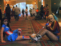 Cosplayers pose in the middle of the floor, after a long last day of convention fun at Wizard World Philadelphia on June 4, 2017. (