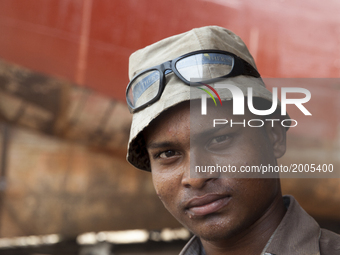 A Dock Yard laborer is working at the workshop for making parts of ship in Keranigonj, Dhaka, Bangladesh 06, 2017. This Dock Yard is situate...