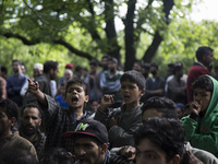 Kashmiri villager children shout pro-freedom slogans during the funeral of a teenager Adil Magray at Shopian, about 60 kilometers (38 miles)...