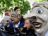 An effigy of British Prime Minister Theresa May and other politicals is seen before being used by anti-Brexit protesters in a demonstration...