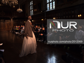 A model walks the runway at the Edward Crutchley show during the London Fashion Week Men's June 2017 collections on June 9, 2017 in London,...