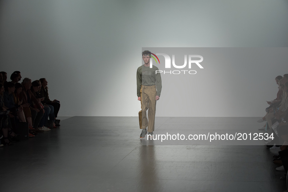 A model walks the runway at the Liam Hodges show during the London Fashion Week Men's June 2017 collections on June 9, 2017 in London, Engla...