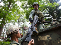 Philippine marines loads weapons in to the truck as they prepare to attack the Islamist rebels in Marawi, southern Philippines on June 9, 20...