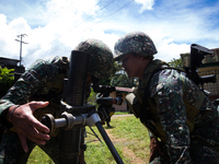 Philippine marines focus the target as they try to attack remaining Islamist rebels during a heavy fight inside Marawi city, southern Philip...